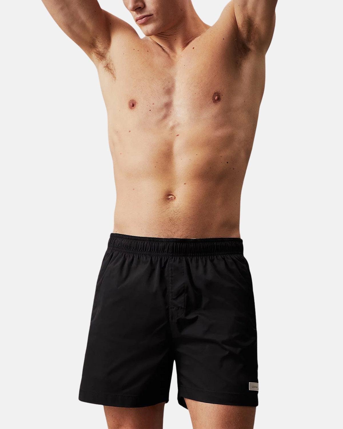 CALVIN KLEIN MEDIUM DRAWSTRING SWIM SHORTS BLACK – CALVIN-KLEIN-KM0KM00939-BEH-S | Studio DOS by Designer Outlet Sales