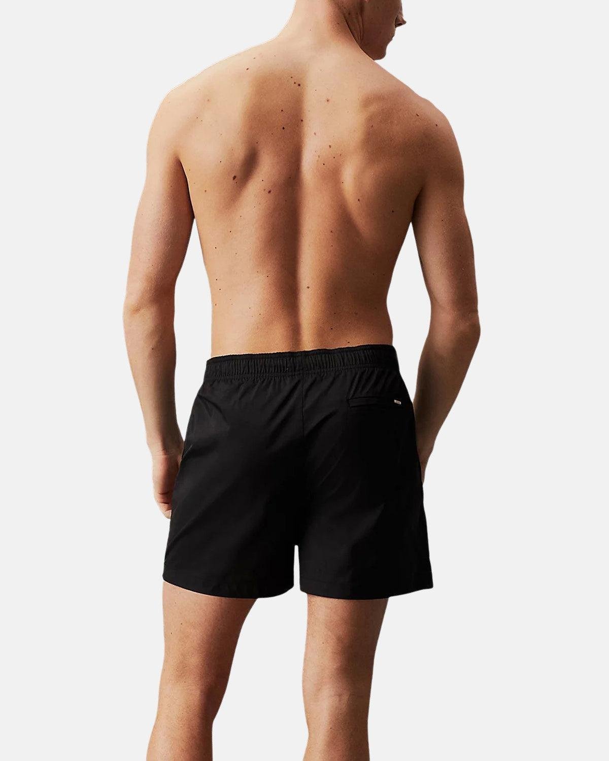 CALVIN KLEIN MEDIUM DRAWSTRING SWIM SHORTS BLACK – CALVIN-KLEIN-KM0KM00939-BEH-S | Studio DOS by Designer Outlet Sales